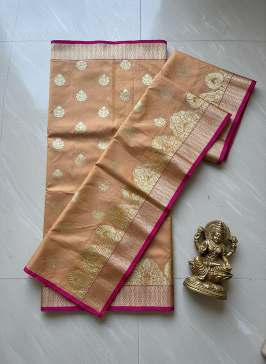 Chikoo color gadwal silk saree with golden zari work contrast rani color border