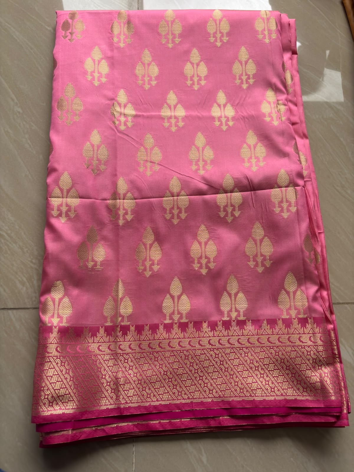 Pink katan banarasi saree.