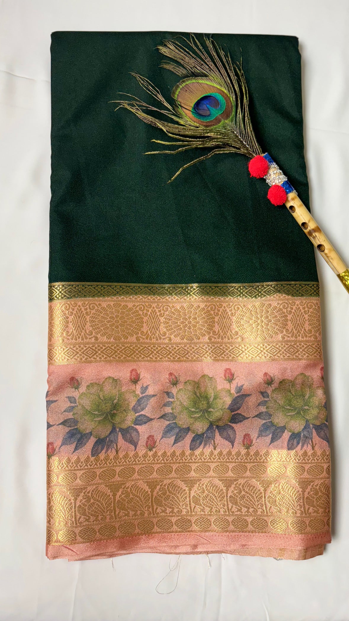 Crepe border print saree with golden zari work.