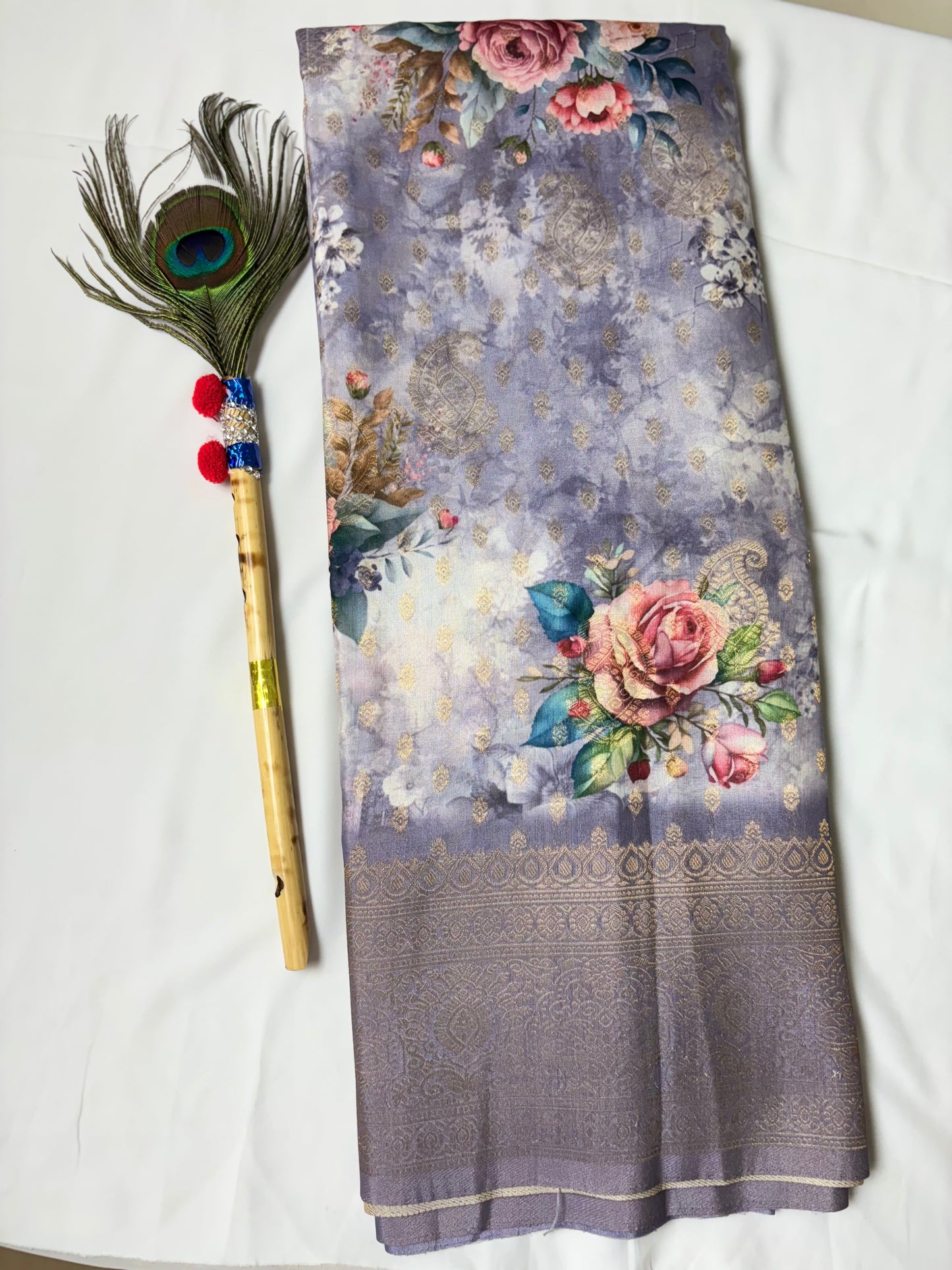 Dola silk printed saree. with golden zari work.
