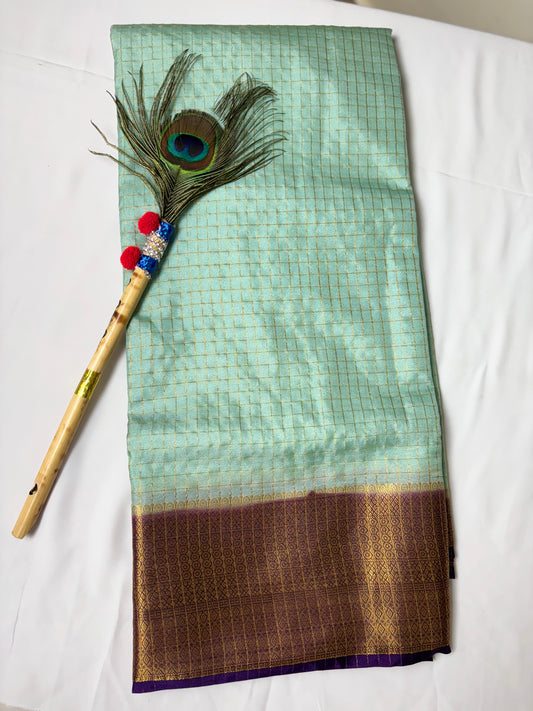 Beautiful crepe checks maroon color saree with lilac golden zari work border