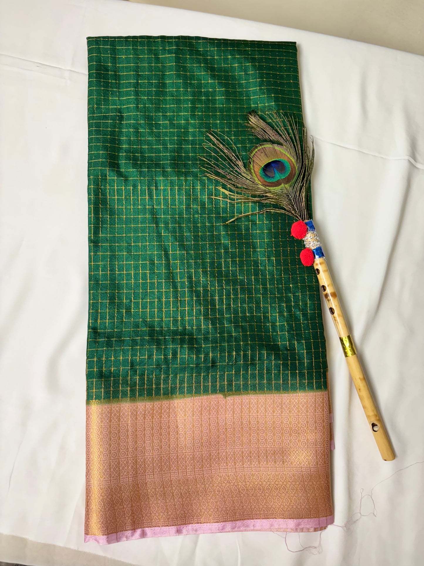 Beautiful crepe checks maroon color saree with lilac golden zari work border