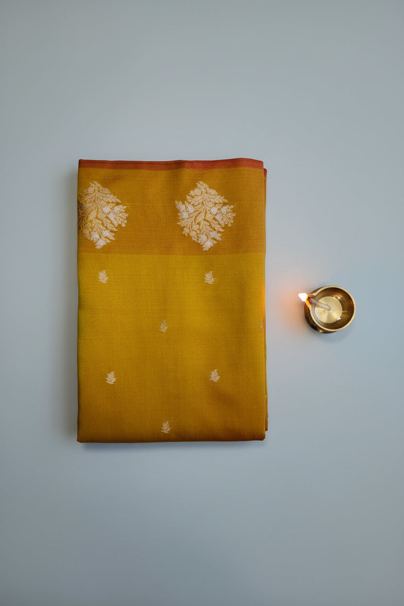 Banarasi silk blue saree with golden zari work.