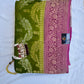 Crush georgette banarasi saree with golden Zari. Mehedi color and rani pink border.