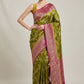 Crush georgette banarasi saree with golden Zari. Mehedi color and rani pink border.