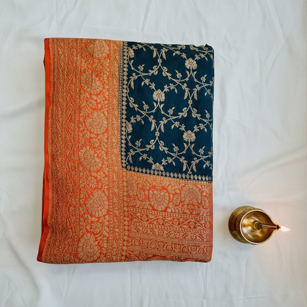 Semi crepe georgette banarasi saree with golden Zari. Mehedi color and rani pink border.
