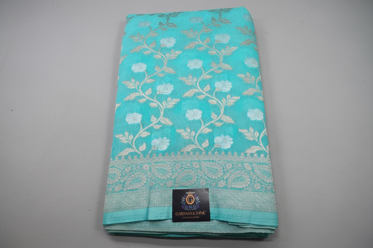 Banarasi goergette sare with golden and silver zari work.