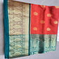 Red soft silk sare with royal blue golden zari border