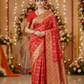 Orange color georgette  bandhani saree with golden zari work saree