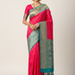 Colorful fabric with intricate patterns and a brand label on a tiled floor.