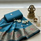 Peacock blue semi organza saree with copper and silver zari and copper minakari