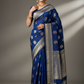 Royal blue soft silksaree with goldn zari motifs with rani pink and orange minakari all over