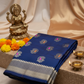 Royal blue soft silksaree with goldn zari motifs with rani pink and orange minakari all over