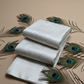 Beautifui silver zari all over self design tissue silk saree