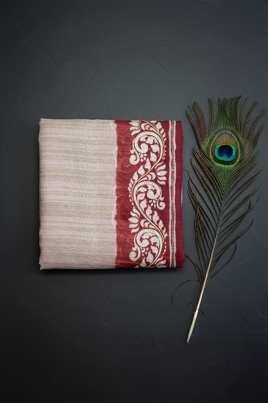 Cotton saree with batik print border.  Knot work and kantha work.Tussar cotton.