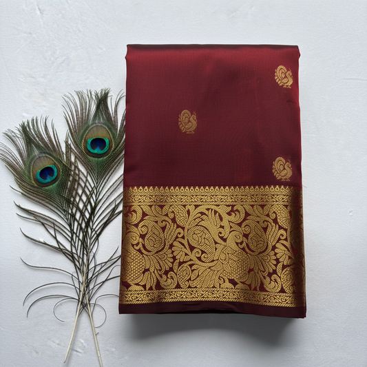 Semi silk saaree with beautiful  elephant golden zari work pallu and border. Maroon color.