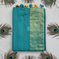 "Elegant Linen Cotton Saree featuring a rich golden zari patta border, beautifully finished with tassels on the pallu, available in vibrant colours."