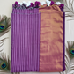 "Elegant Linen Cotton Saree featuring a rich golden zari patta border, beautifully finished with tassels on the pallu, available in vibrant colours."