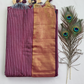 "Elegant Linen Cotton Saree featuring a rich golden zari patta border, beautifully finished with tassels on the pallu, available in vibrant colours."