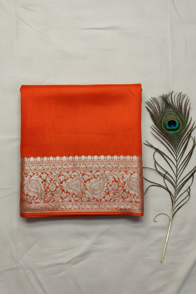 Beautiful vibrant Dola Silk saree featuring an elegant golden zari border and a richly woven golden zari pallu, paired with a stunning contrast blouse for a timeless look.