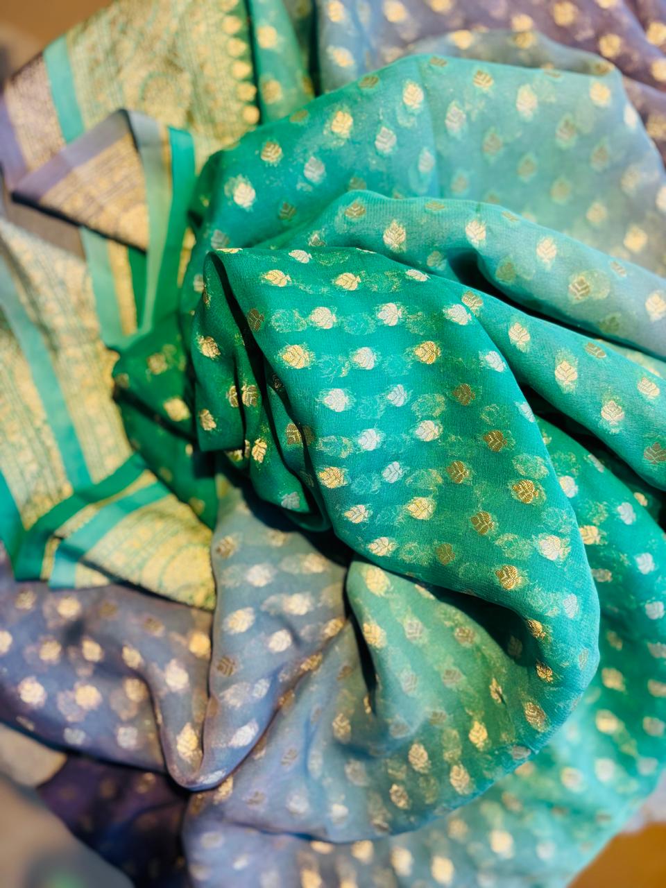 pure khaddi goergette multi shaded pure banarasi silk saree with golden zari and goledn motifs.