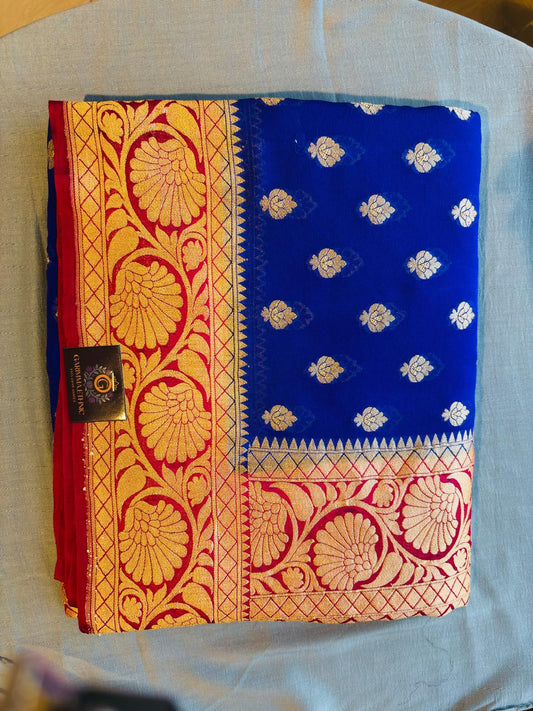 pure khaddi goergette royal blue and border contrast red color pure benarasi saree