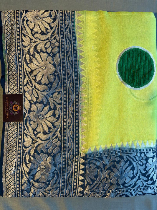 Pure khaddi goergette pastel greenish yellow color saree with royal blue border with silver zari with velver circle motifs