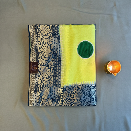Pure khaddi goergette pastel greenish yellow color saree with royal blue border with silver zari with velver circle motifs