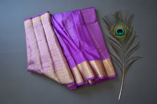 Warm silk banrasi saree with golden zari work pallu and blouser